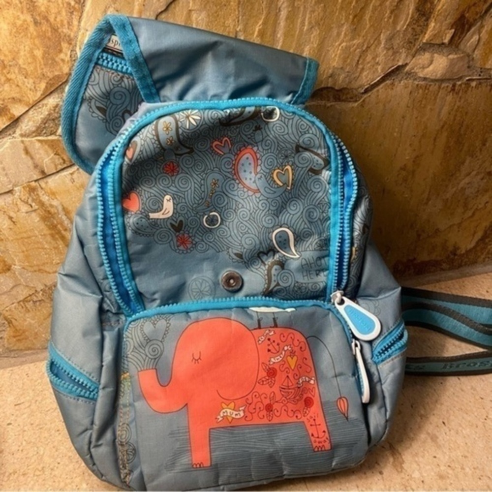 Brosports backpack in a shade of teal with elephants and birds - fun to wear